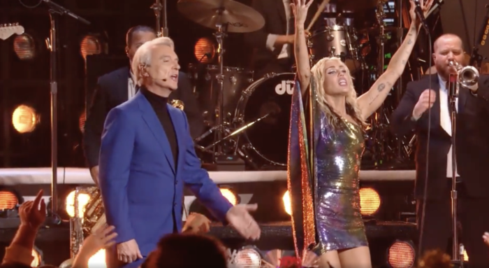 Watch Now: David Byrne Joins Miley Cyrus at New Year’s Eve Celebration, Cover David Bowie’s “Let’s Dance”