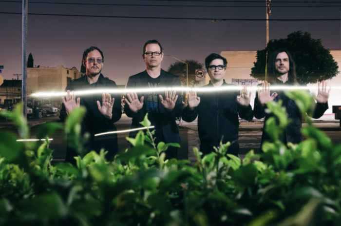 Watch: Weezer Perform Acoustic Pop-Up Set in Support of Support Writers Strike
