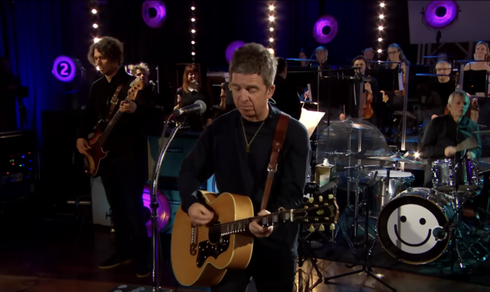 Listen Now: Noel Gallagher Covers Joy Division’s “Love Will Tear Us Apart” With BBC Concert Orchestra